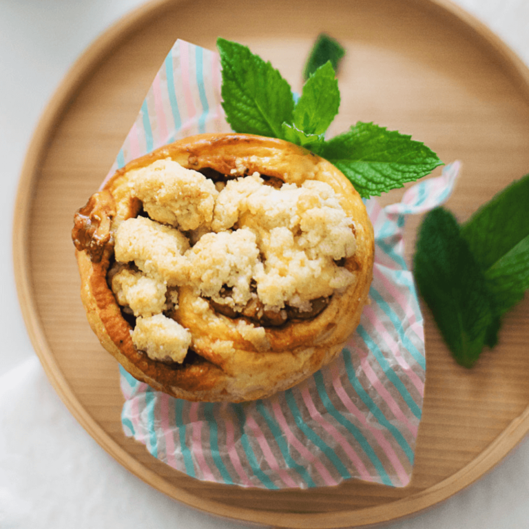 Muffin displayed on a tray and decorated with mint from Sam's Recipe Book