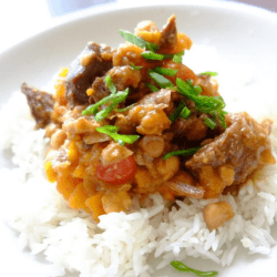 A dish of Moroccan beef stew served with white rice