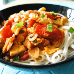 Noodles with Tomato and Egg served in a bowl as a Chinese dish