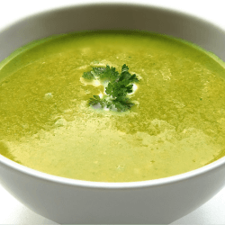 Potato chive and spinach soup in a white bowl. Recipe from Sam's Recipe Book