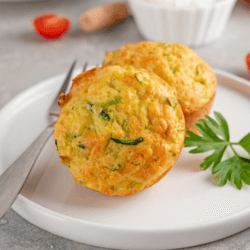 Two air fryer rice cakes on a white dish with a fork on the side from Sam's Recipe Books 5 Quick and Easy Air Fryer Snacks Recipes