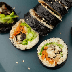 Wraps of sushi with rice, seafood, and vegetables wrapped in seaweed