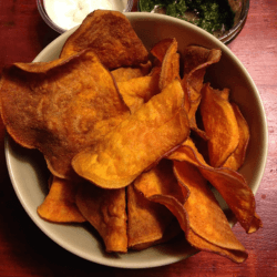 A bowl of sweet potato chips from Sam's Recipe Book's sweet potato air fryer recipe